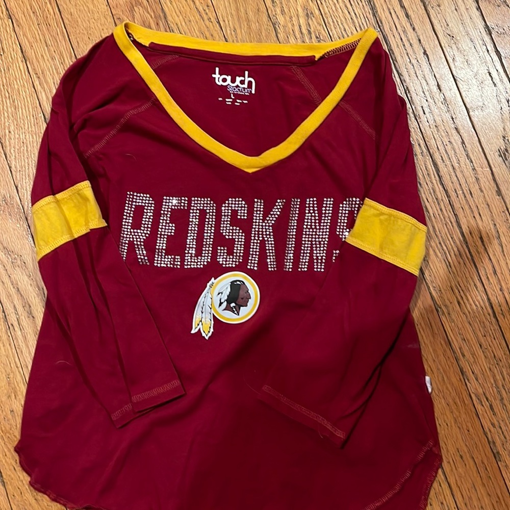 Shirt runs more like a small not large